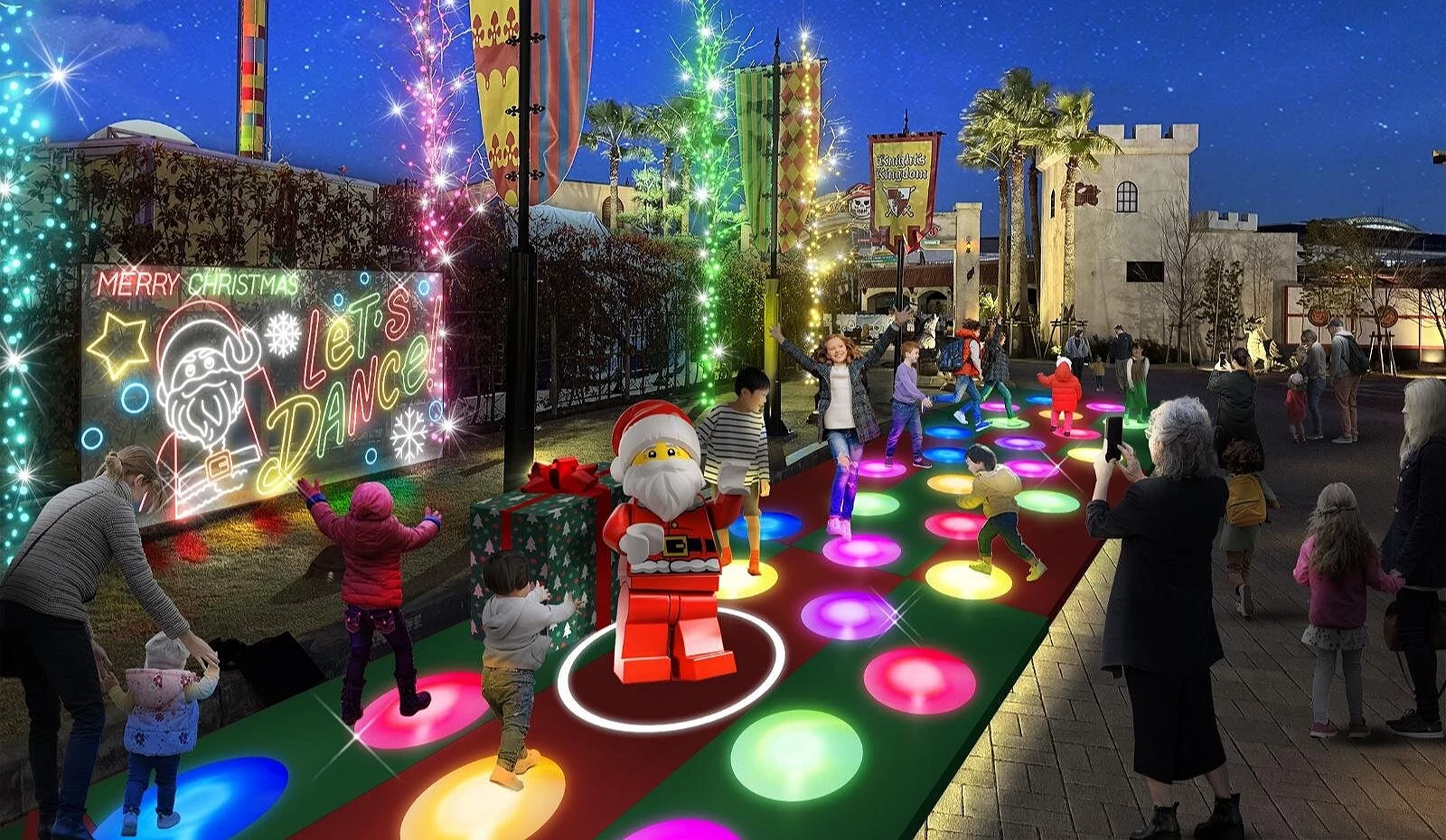 名古屋乐高乐园夜间点灯活动区,孩子踩着会发光发声的地板与圣诞老人互动