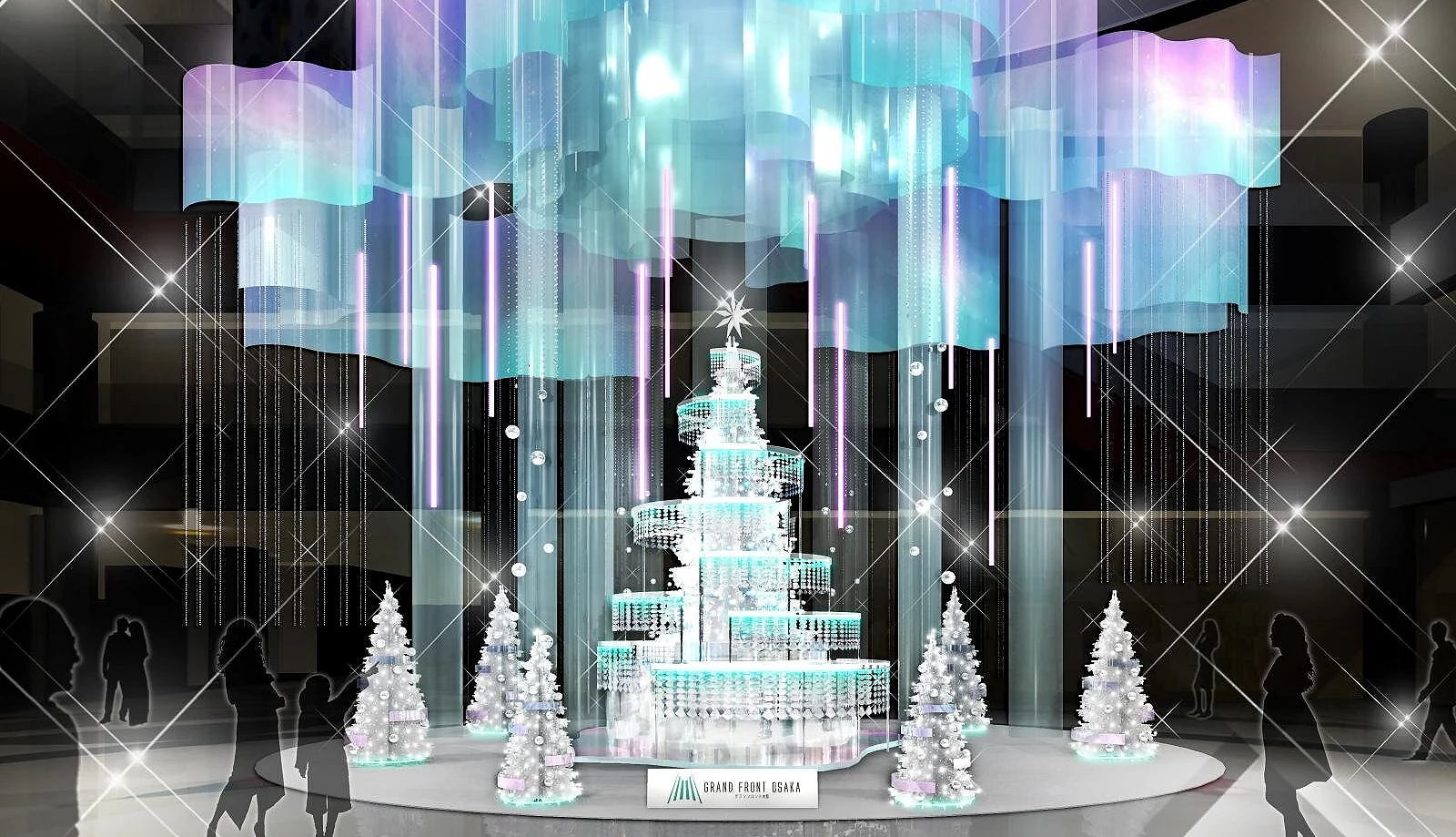 大阪 Grand Front Osaka 圣诞树白色与蓝紫色灯光交融,透明光幕垂挂营造冰晶般的梦幻氛围