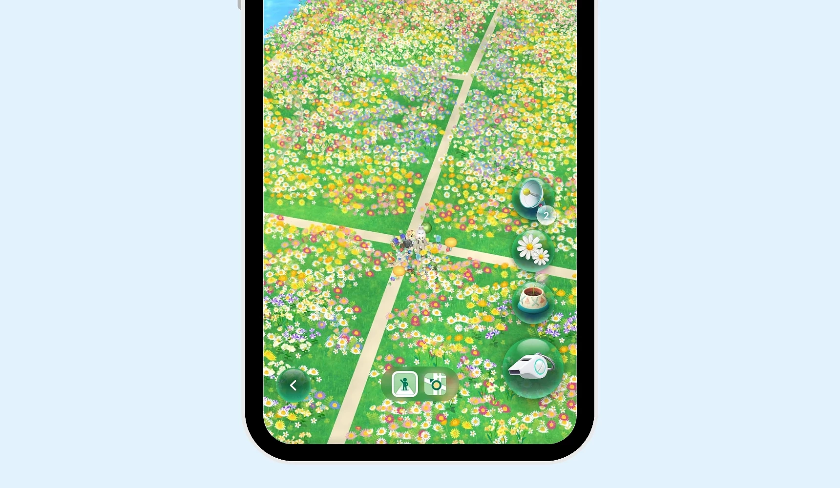 手机画面显示《Pikmin Bloom》地图,玩家行走路径铺满各色花朵,形成大片花海,显示种花与移动的结果
