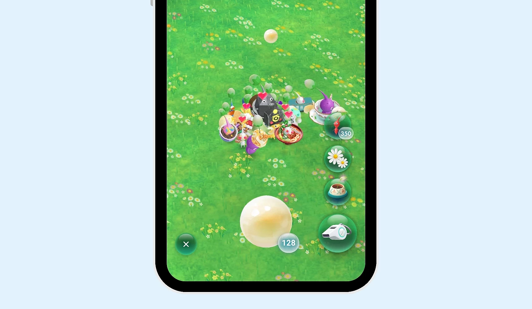 手机画面显示《Pikmin Bloom》中多只皮克敏围绕并搬运一颗大型圆形果实,草地上散布花朵,右侧显示花瓣与道具图示,下方标示果实所需搬运数量