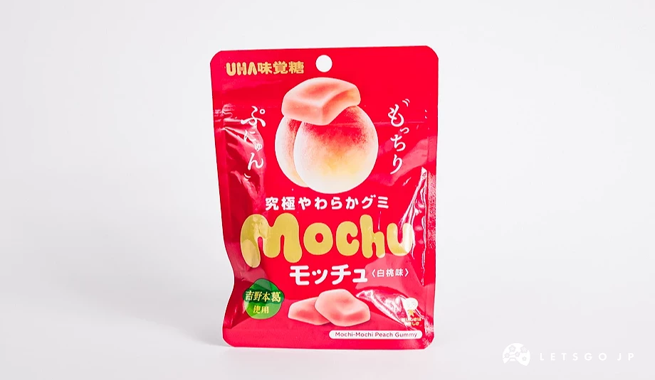 红色包装袋水蜜桃软糖,印有Mochu字样