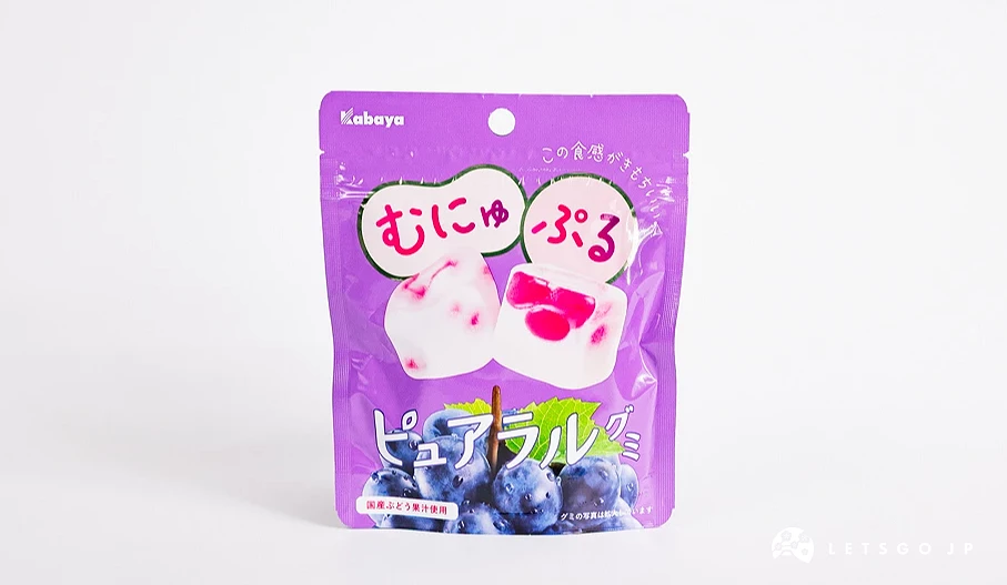紫色包装袋,印有むにゅぷる字样与白色方块果冻图案