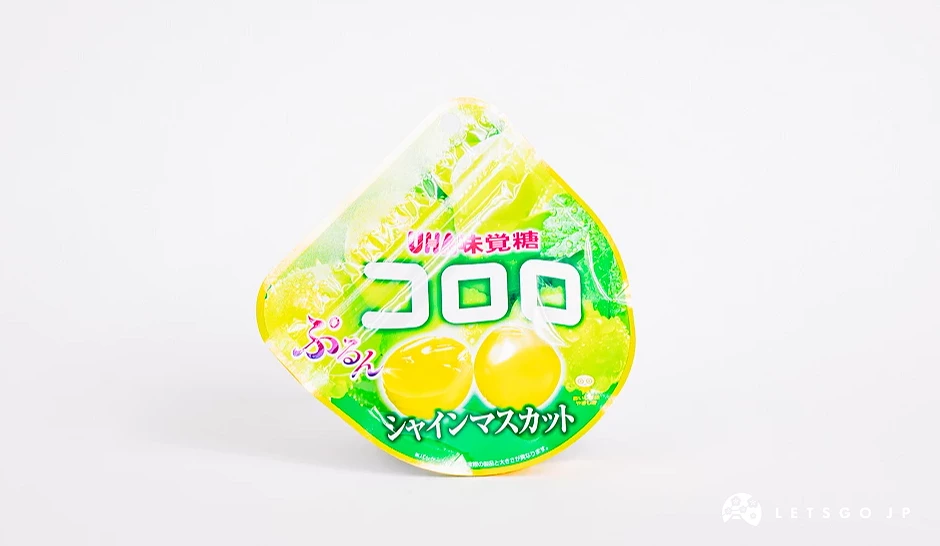 绿色半圆形包装袋,印有コロロ字样与青葡萄图案