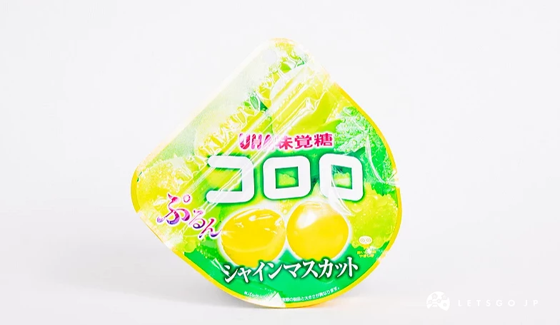 綠色半圓形包裝袋,印有コロロ字樣與青葡萄圖案