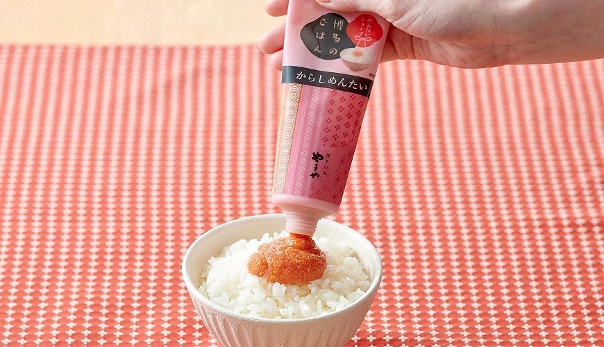 軟管明太子醬擠在白飯上
